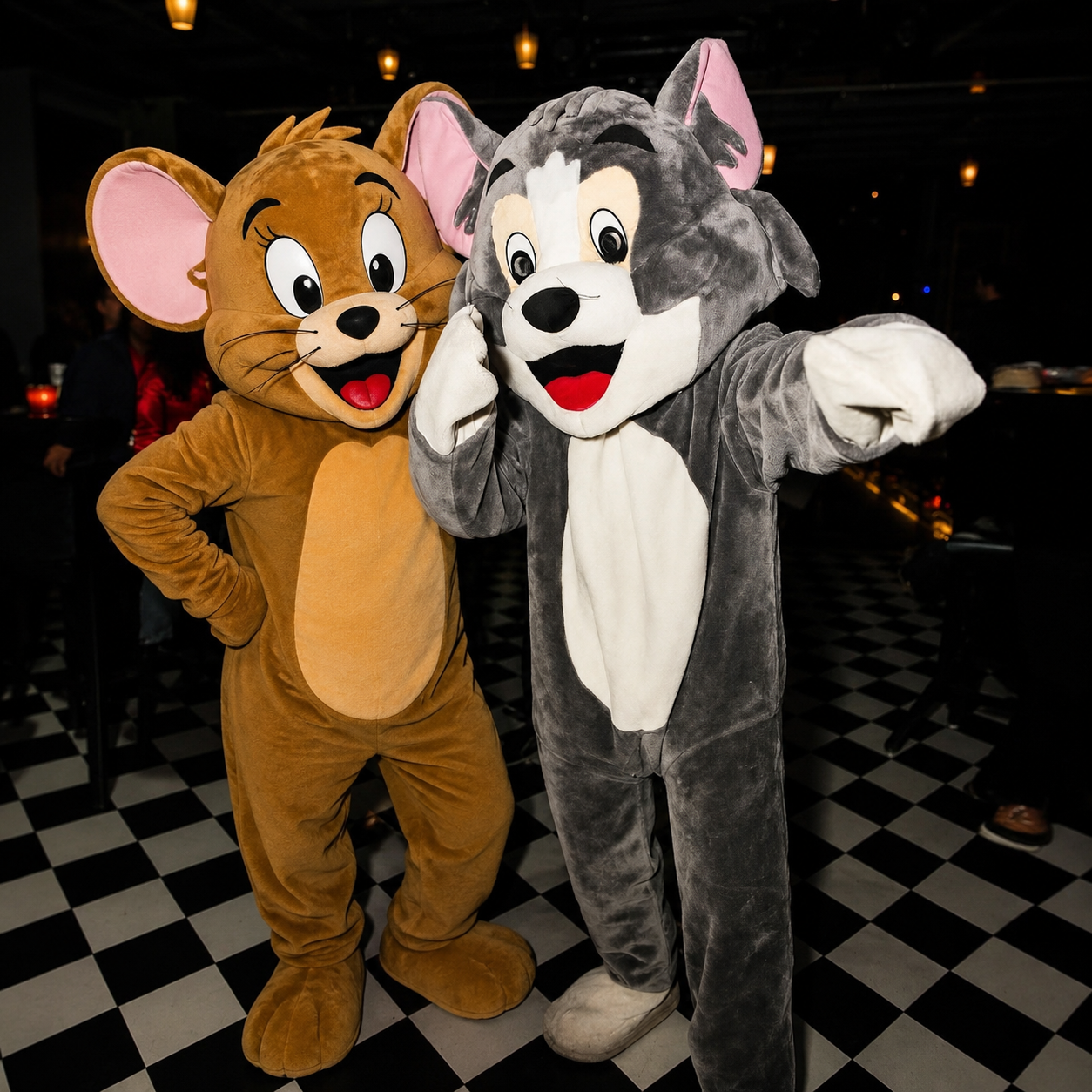 Tom and Jerry mascot for birthday party entertainment with premium cartoon character costume for kids birthday celebrations and theme events.